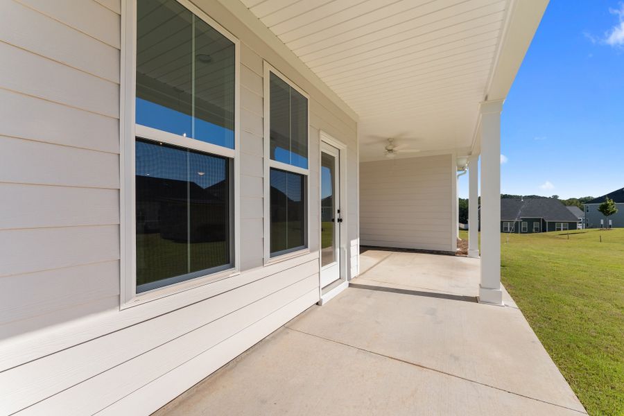 Exterior details and patio area of a home in Cottages at Lake Emory, Inman (Image 26). Exterior details and patio area of a home in Cottages at Lake Emory, Inman (Image 26).
