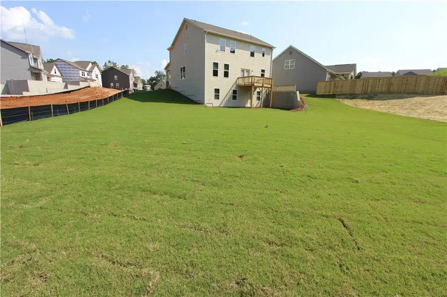 Exterior details and patio area of a home in Clark Farms, Flowery Branch (Image 3).