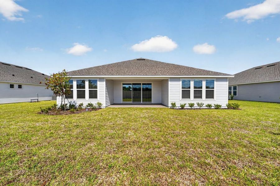 Exterior details and patio area of a home in Headwaters at Lofton Creek, Yulee (Image 20).