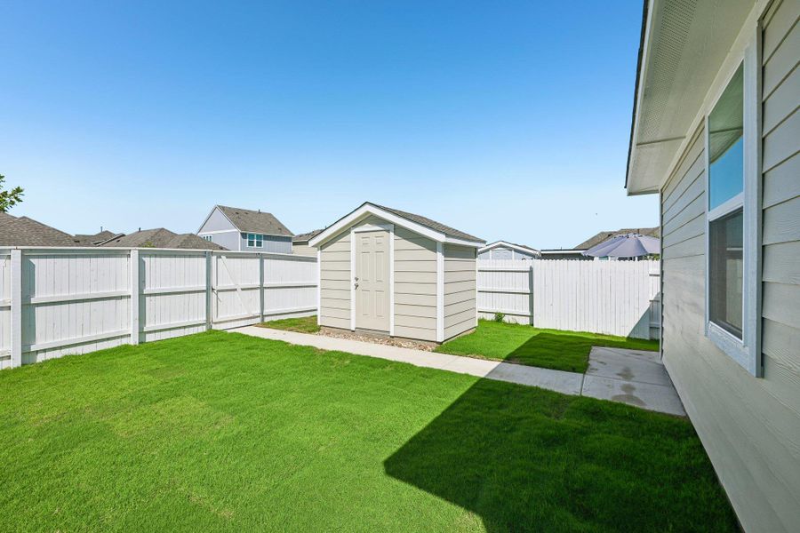 Exterior details and patio area of a home in Harvest Ridge, Elgin (Image 17).