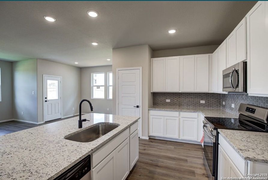 Furnished interior view inside a new home in Royal Crest, San Antonio (Image 6).
