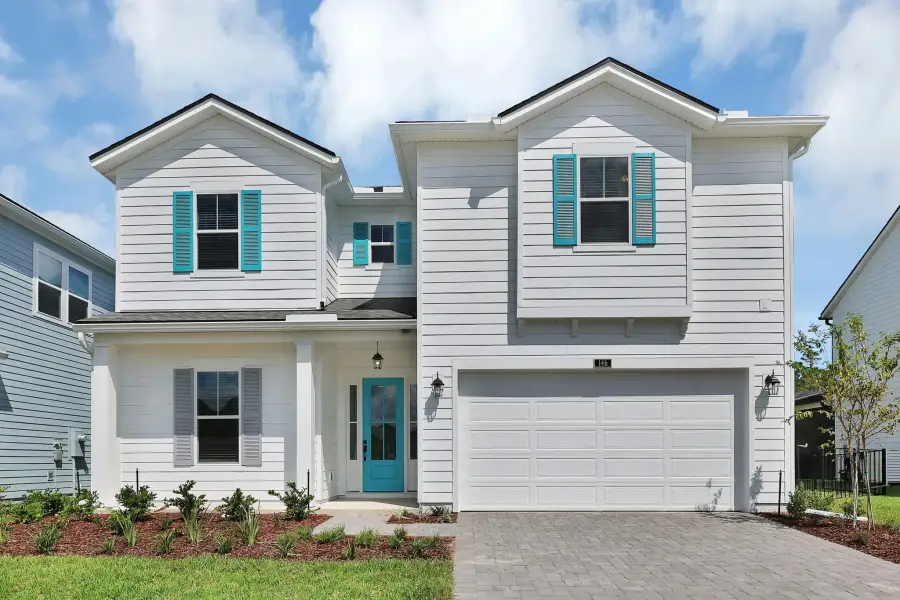 Representative exterior photo of a completed home built from the Crescent by Riverside Homes in Sagebrush at EverRange, Jacksonville, FL (Image 26).