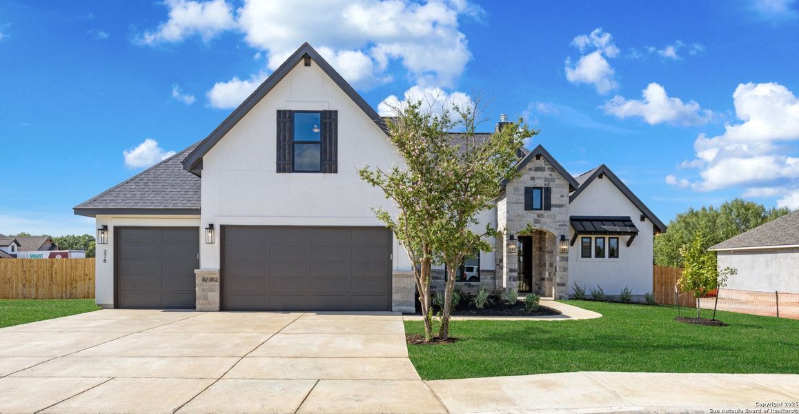 Front exterior of a new home in , Castroville, TX, highlighting curb appeal (Image 22).