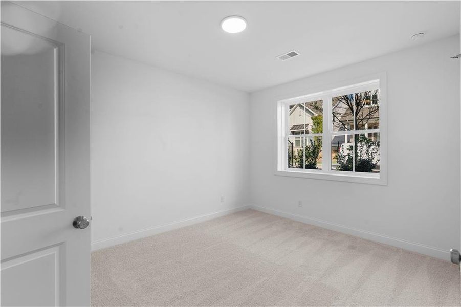 Spacious, unfurnished interior of a new home in Evanshire Townhomes, Duluth (Image 31). Spacious, unfurnished interior of a new home in Evanshire Townhomes, Duluth (Image 31).