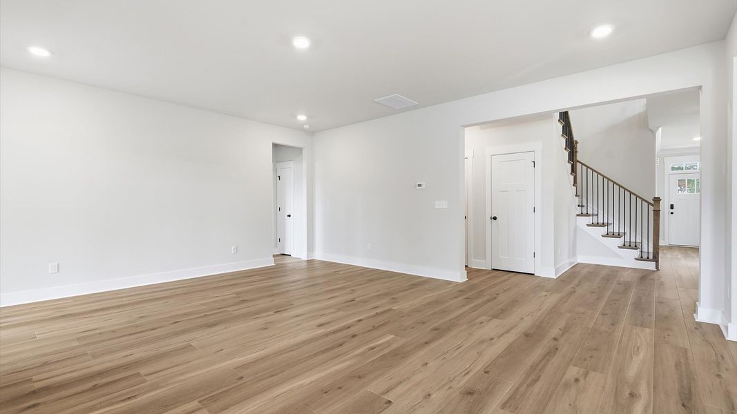 Exceptional family room with hardwood flooring in this exclusive Greenville-area home