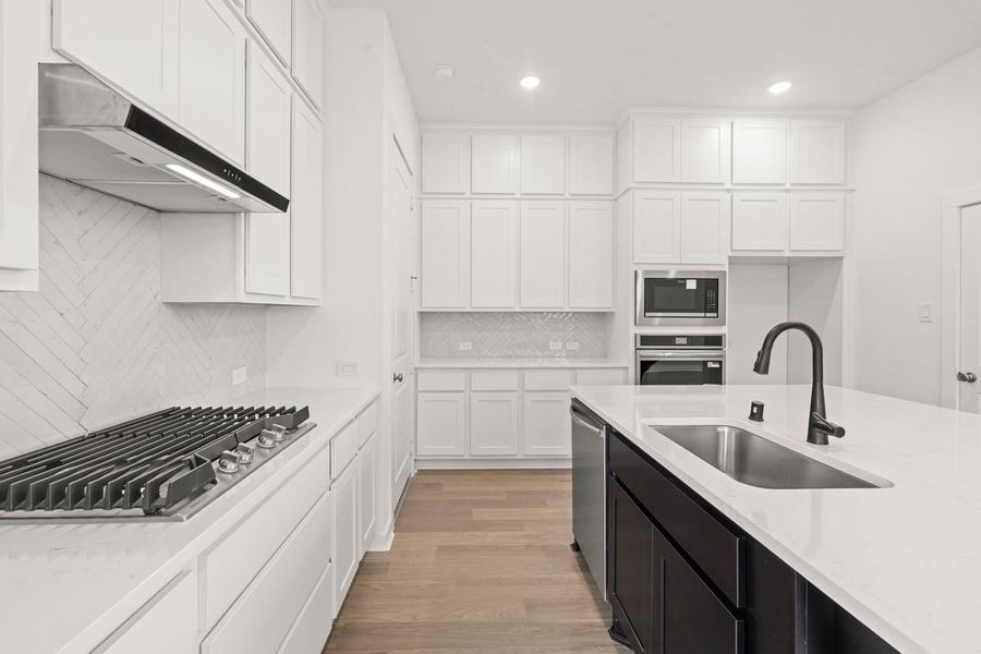 Furnished interior view inside a new home in Bridgeland, Cypress (Image 9).