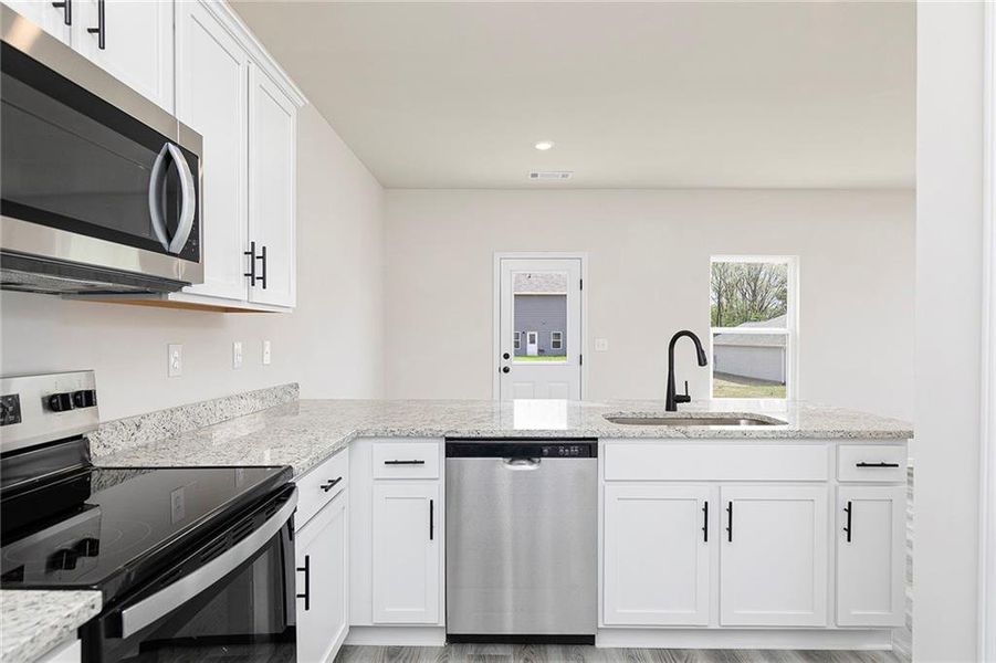 Furnished interior view inside a new home in Lake Preserve at Jackson Trail, Jefferson (Image 3). Furnished interior view inside a new home in Lake Preserve at Jackson Trail, Jefferson (Image 3).