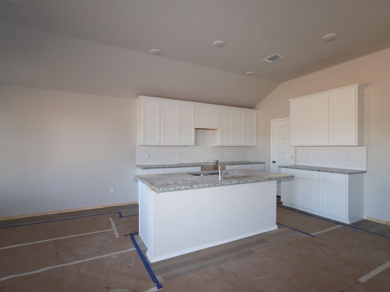 In-progress construction of a new home in Carillon, Manor, TX (Image 6).