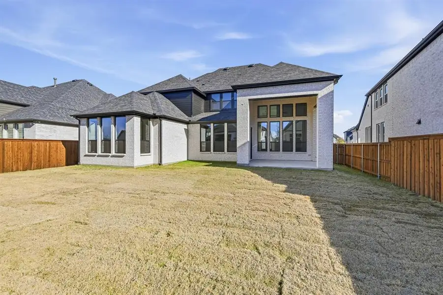 Exterior details and patio area of a home in Mosaic: 60ft. lots, Celina (Image 2).