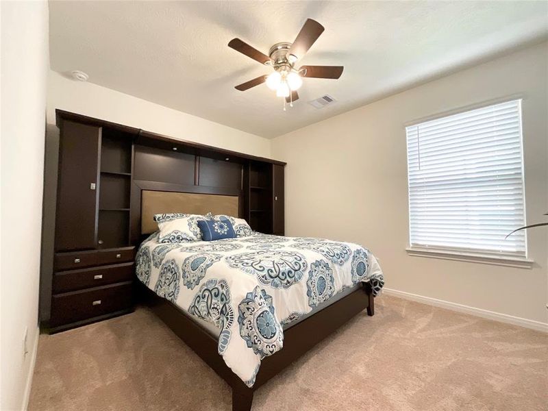 Another Secondary Bedroom with ceiling fan.