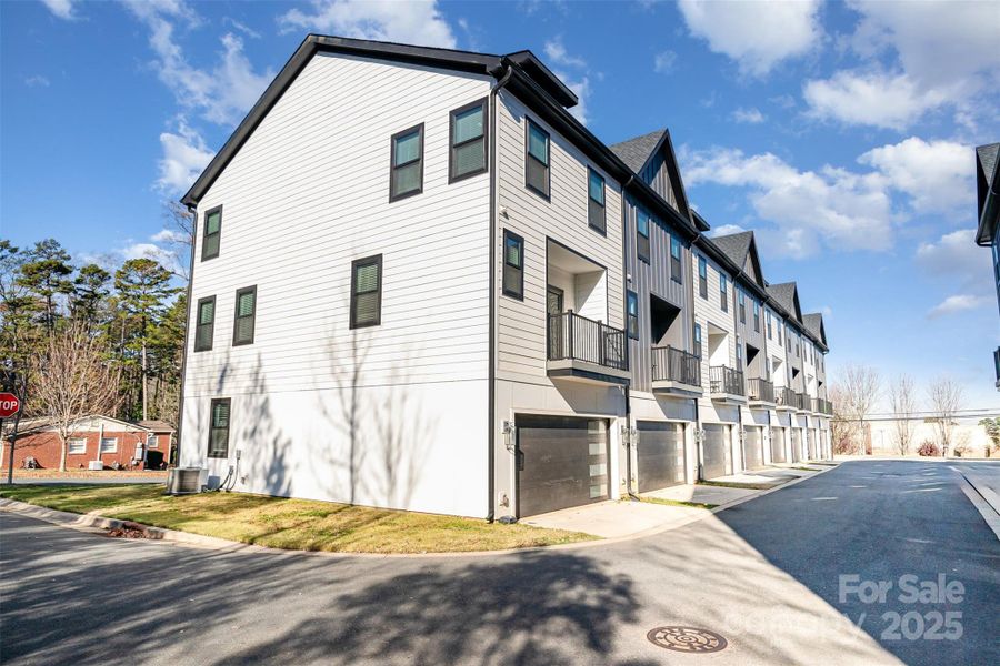 Front exterior of a new home in , Charlotte, NC, highlighting curb appeal (Image 22).