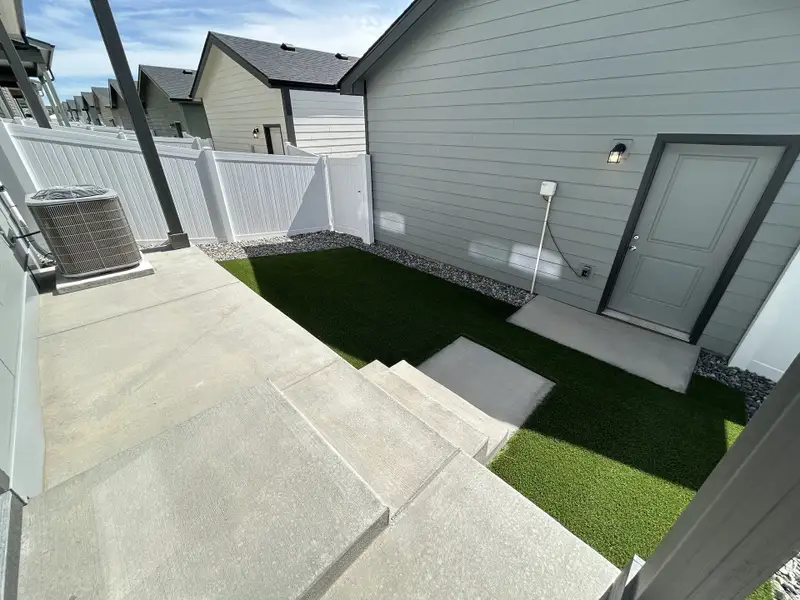 Exterior details and patio area of a home in Liberty Draw, Evans (Image 3).