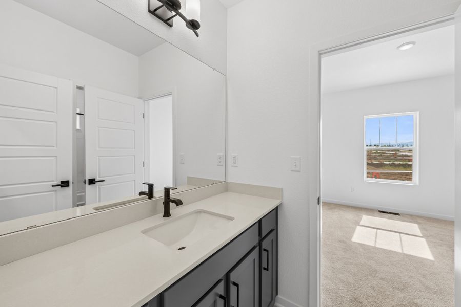 Furnished interior view inside a new home in Baseline Peaks Collection, Broomfield (Image 6).