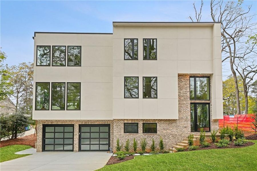 Front exterior of a new home in , Atlanta, GA, highlighting curb appeal (Image 30).