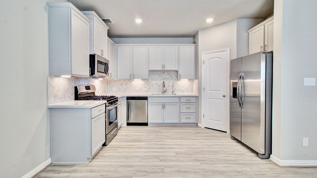 Representative furnished interior of a home built from the Compass by Brightland Homes in Mostyn Springs, Magnolia (Image 8).