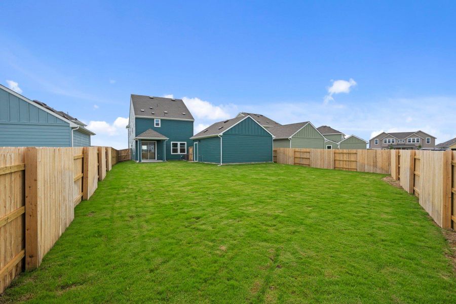 Rear of Home and Private Backyard