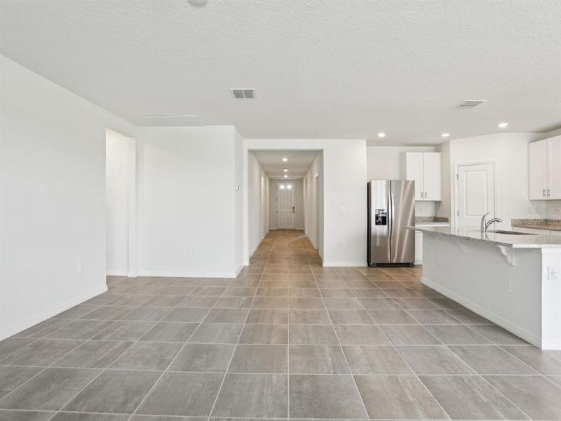 Spacious, unfurnished interior of a new home in The Reserve at Van Oaks, Auburndale (Image 30).