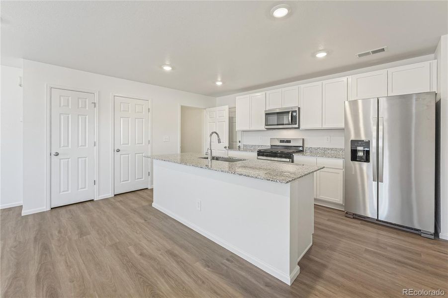 Furnished interior view inside a new home in , Aurora (Image 3).