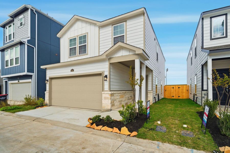 Front exterior of a new home in Lakes at Black Oak, Magnolia, TX, highlighting curb appeal (Image 16).
