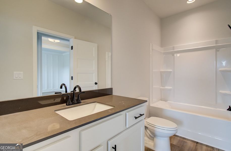 Furnished interior view inside a new home in Ponderosa Farms Reserve, Gainesville (Image 17).