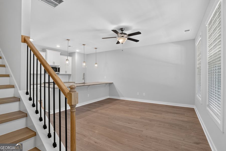 Spacious, unfurnished interior of a new home in The Cottages at East Lanier, Fayetteville (Image 11).