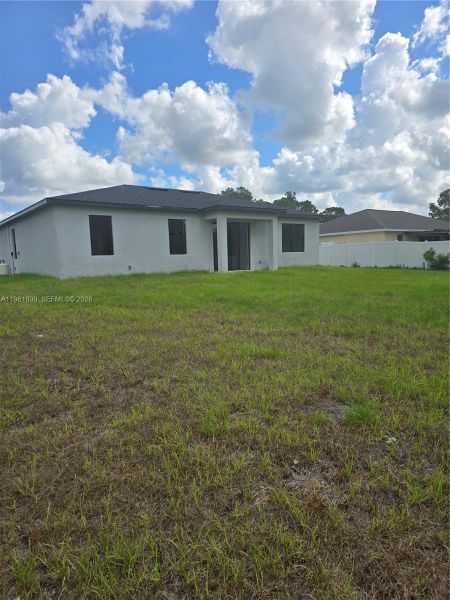 Exterior details and patio area of a home in , Lehigh Acres (Image 3).