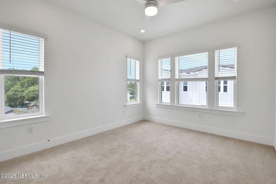 Spacious, unfurnished interior of a new home in North Beach Townhomes, Jacksonville Beach (Image 28).