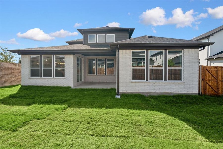 Exterior details and patio area of a home in Impression 55s, Frisco (Image 14).