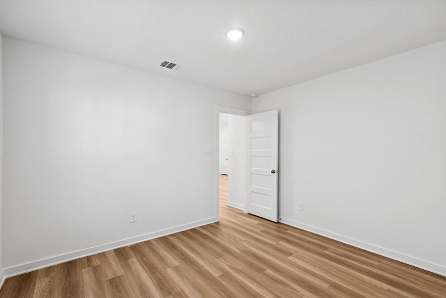 Spacious, unfurnished interior of a new home in Wildrye, Waller (Image 21).