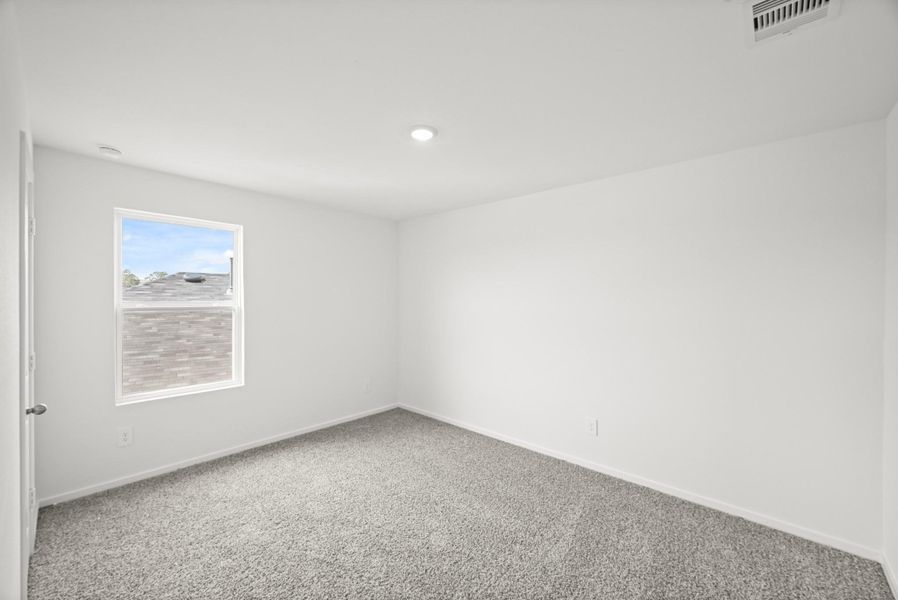 Spacious, unfurnished interior of a new home in Grand Pines, Magnolia (Image 24).