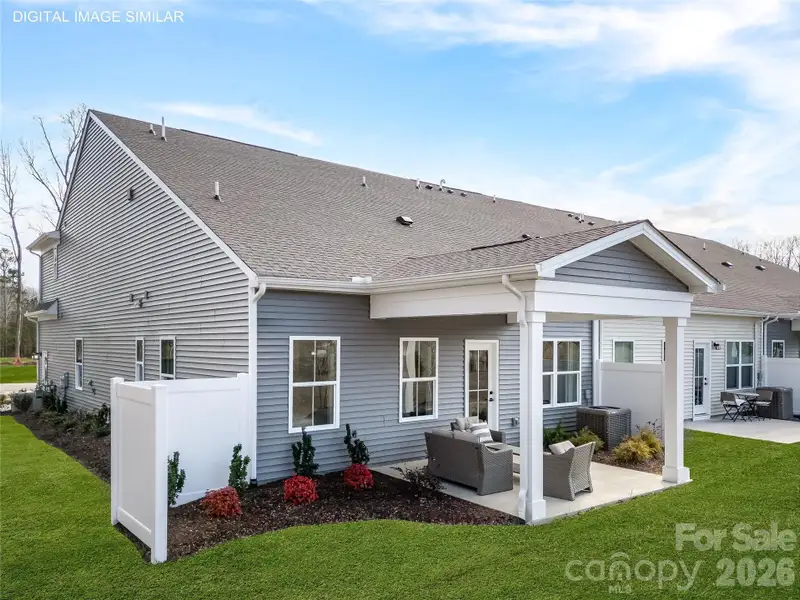 Optional covered rear patio with private divider is ideal for relaxing or entertaining with low-maintenance outdoor living. Optional covered rear patio with private divider is ideal for relaxing or entertaining with low-maintenance outdoor living.