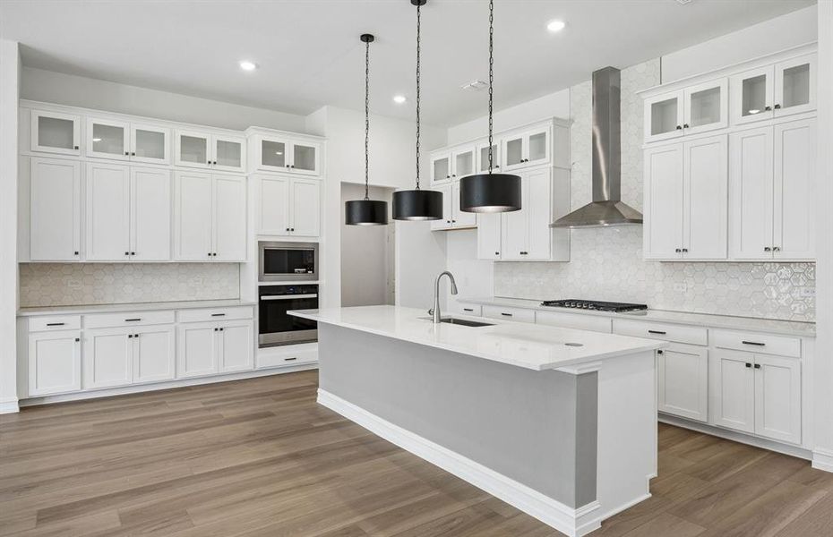 Spacious kitchen with eat-in bartop island