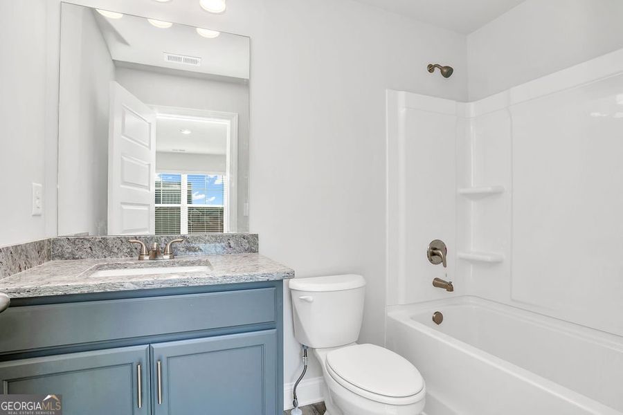 Furnished interior view inside a new home in Harley Farms South, Bonaire (Image 8).