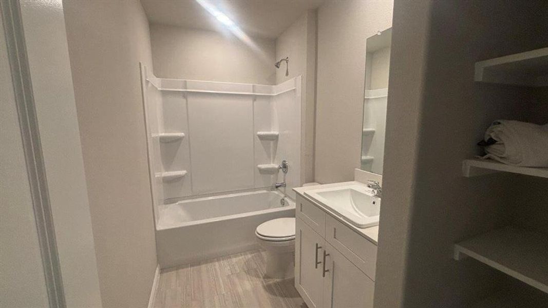 Furnished interior view inside a new home in Highlands at Chapel Creek, Fort Worth (Image 6).