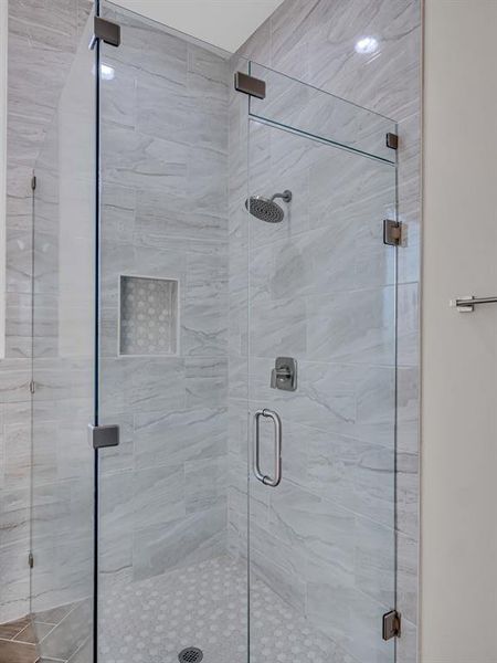 Bathroom with an enclosed shower