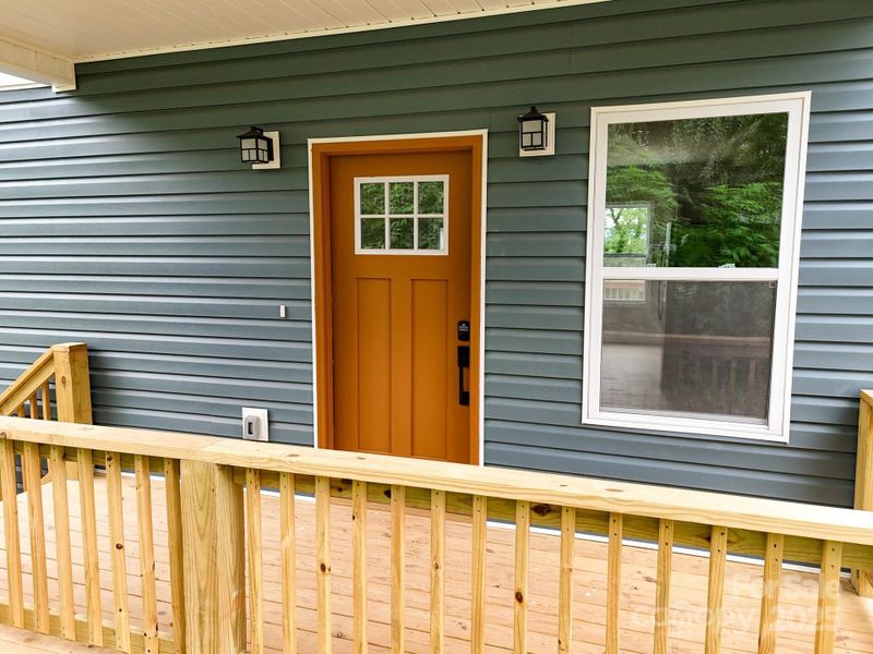 Front exterior of a new home in , Asheville, NC, highlighting curb appeal (Image 21).