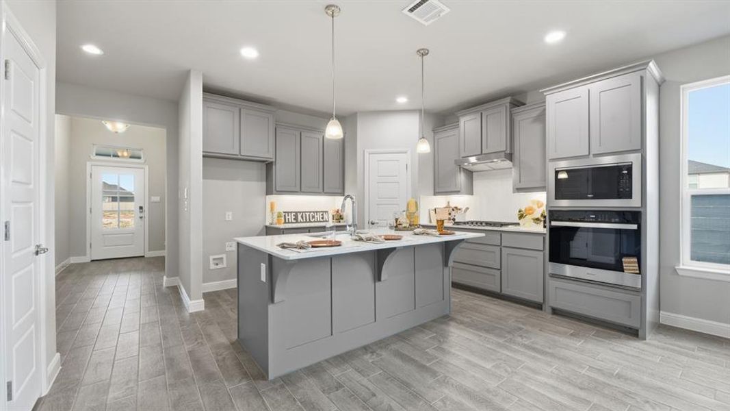 Kitchen-All Home and community information, including pricing, included features, terms, availability and amenities, are subject to change at any time without notice or obligation. All Drawings, pictures, photographs, video, square footages, floor plans, elevations, features, colors and sizes are approximate for illustration purposes only and will vary from the homes as built.