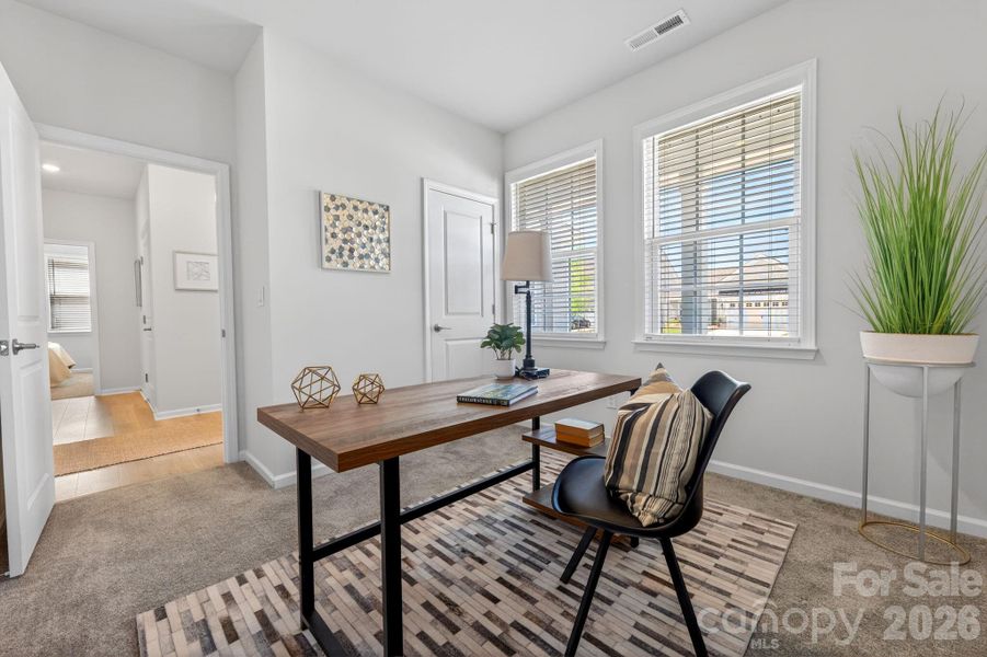 Furnished interior view inside a new home in Esplanade at Northgate, Indian Trail (Image 11).