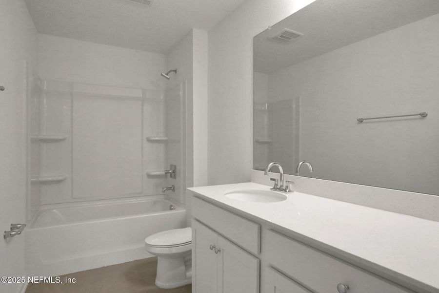 Furnished interior view inside a new home in TrailMark, St. Augustine (Image 14).