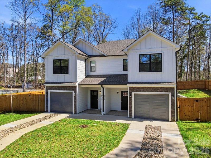 Front exterior of a new home in , Charlotte, NC, highlighting curb appeal (Image 24).