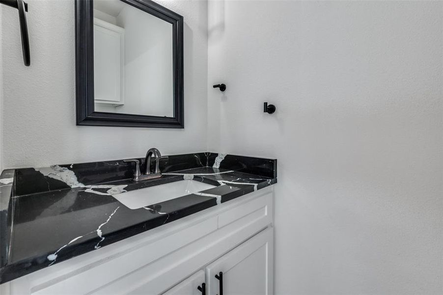 Bathroom featuring vanity