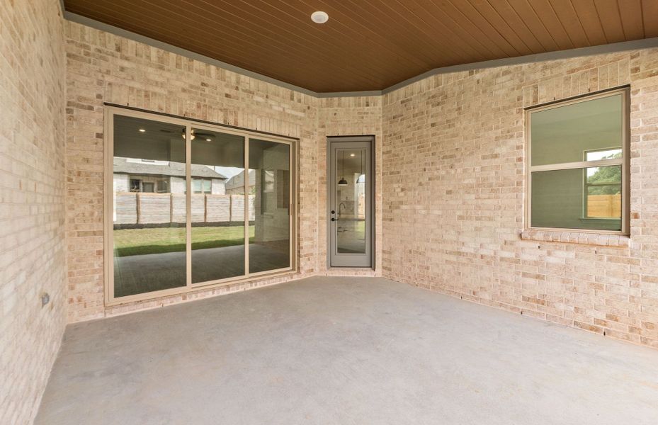 Exterior details and patio area of a home in Bluffview Reserve, Leander (Image 35).