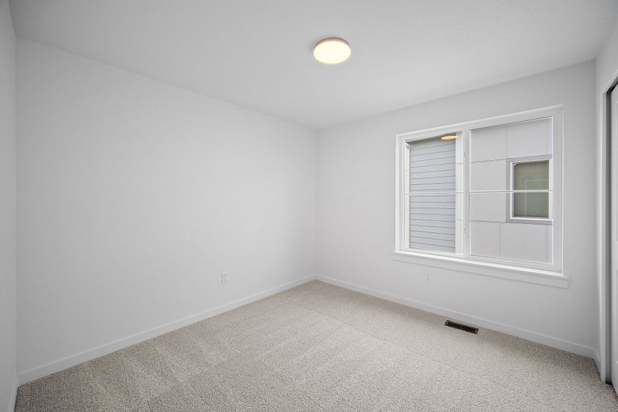 Spacious, unfurnished interior of a new home in The Commons at Victory Ridge, Colorado Springs (Image 35).