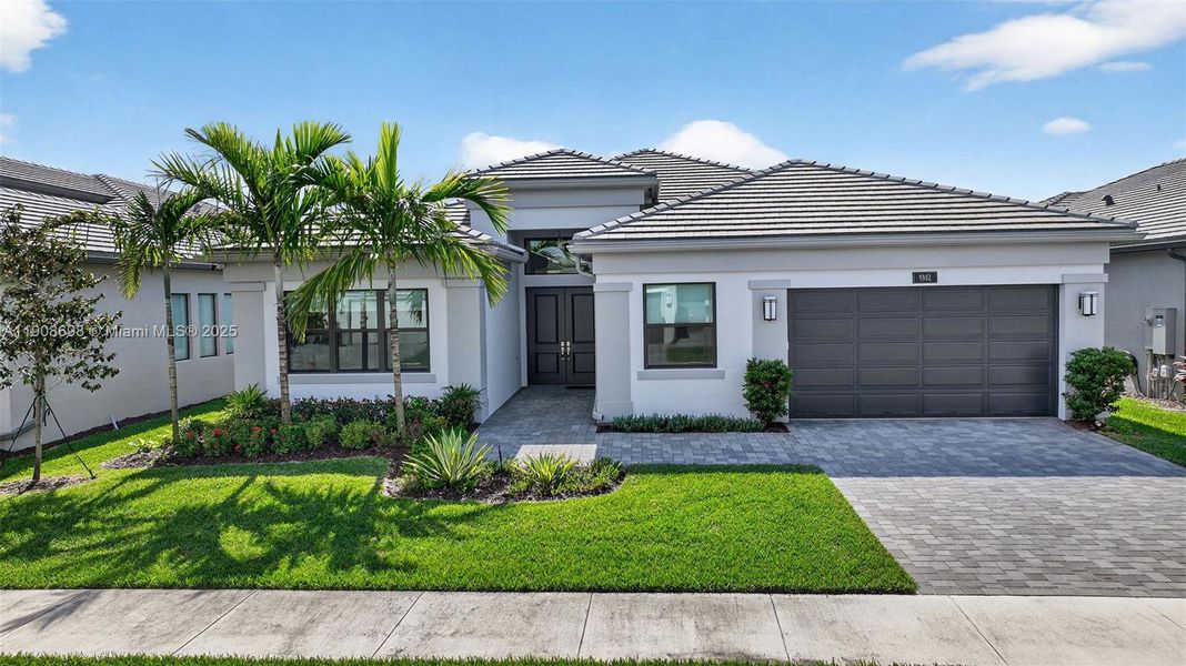 Front exterior of a new home in , Boynton Beach, FL, highlighting curb appeal (Image 29).