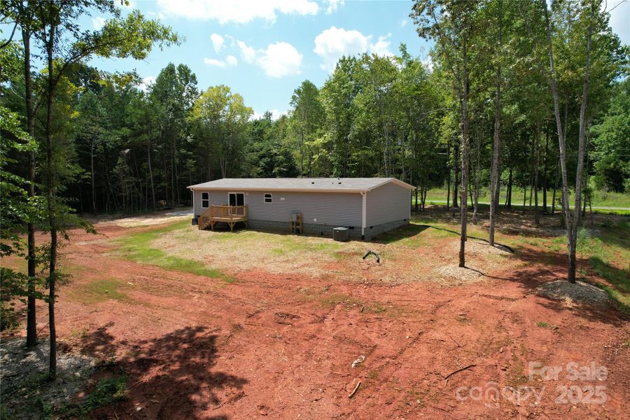 Front exterior of a new home in , Yadkinville, NC, highlighting curb appeal (Image 8).