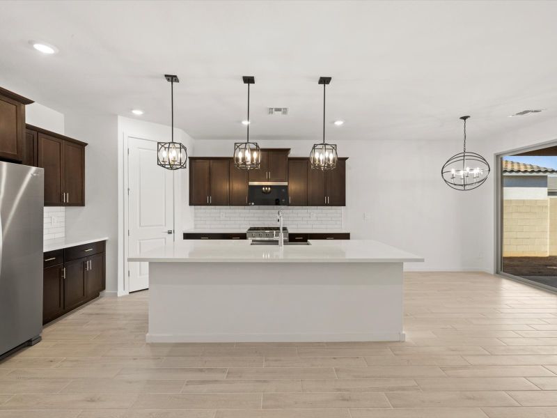 Furnished interior view inside a new home in Mountain View Estates Signature Series, Buckeye (Image 5).