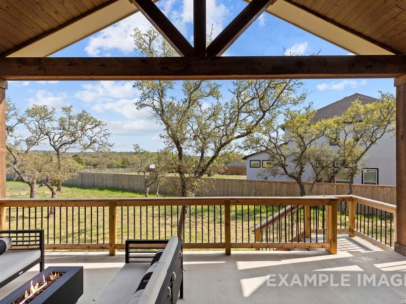 Exterior details and patio area of a home in The Reserve at Potranco Oaks, Castroville (Image 3).