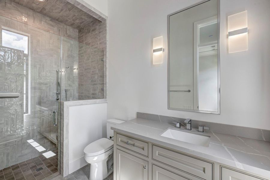 Secondary bathroom with beautiful tile work. Secondary bathroom with beautiful tile work.