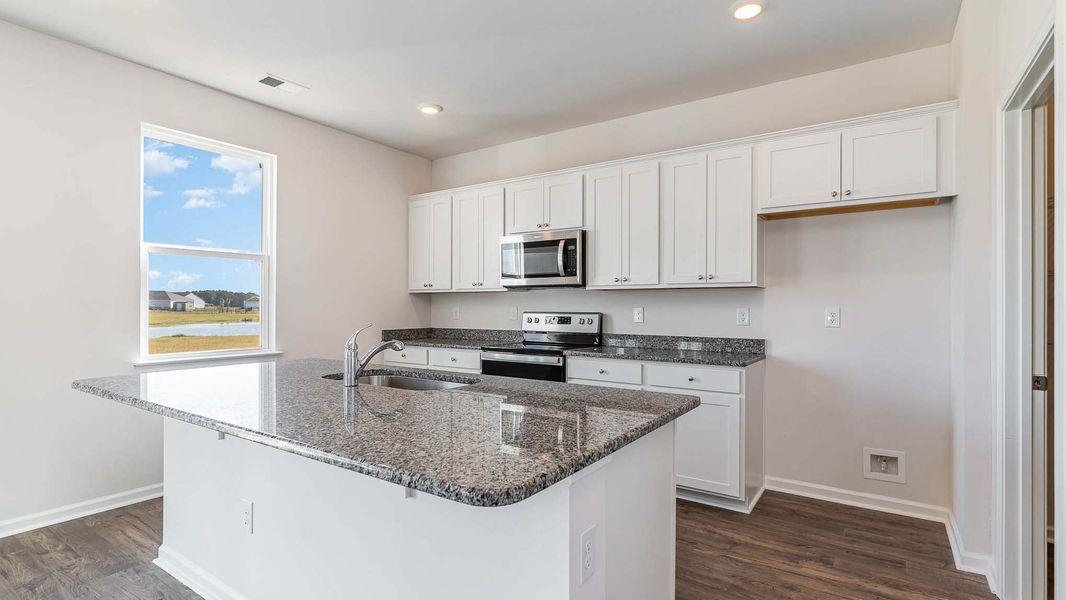 Furnished interior view inside a new home in Auberon Woods, Conway (Image 4).