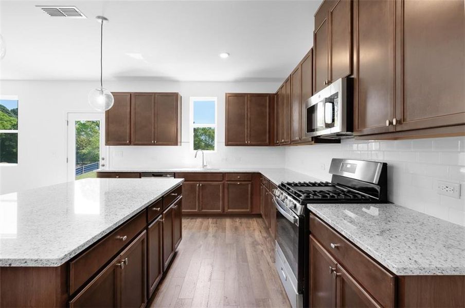 Furnished interior view inside a new home in Windance Lake, Loganville (Image 5).